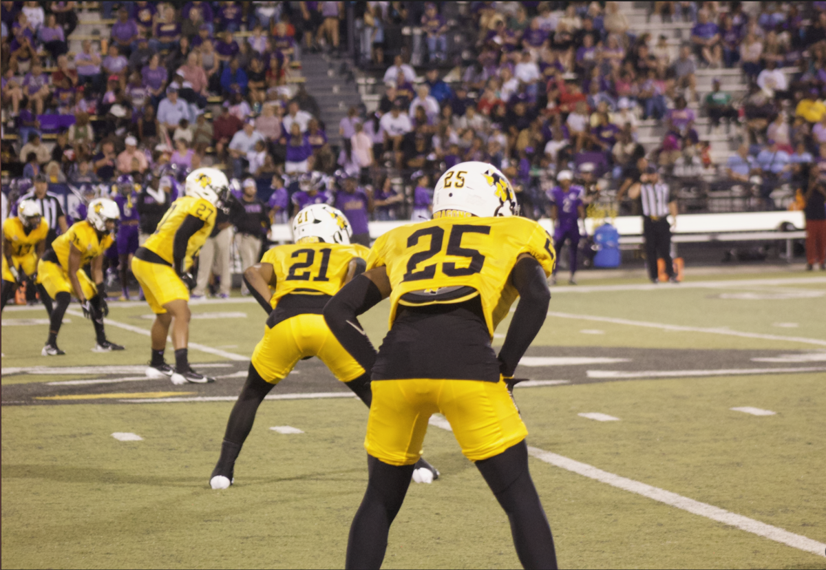 Players line up to receive a kickoff during the game against the Panthers on Friday night.